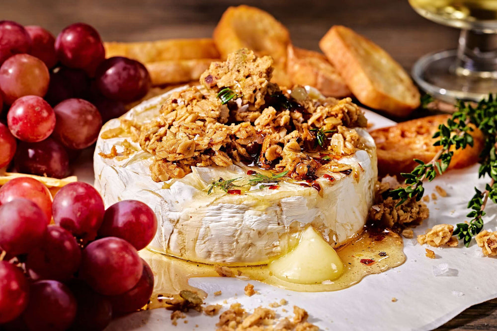 Sweet and Spice Baked Brie with Granola Crunch - vegan options available