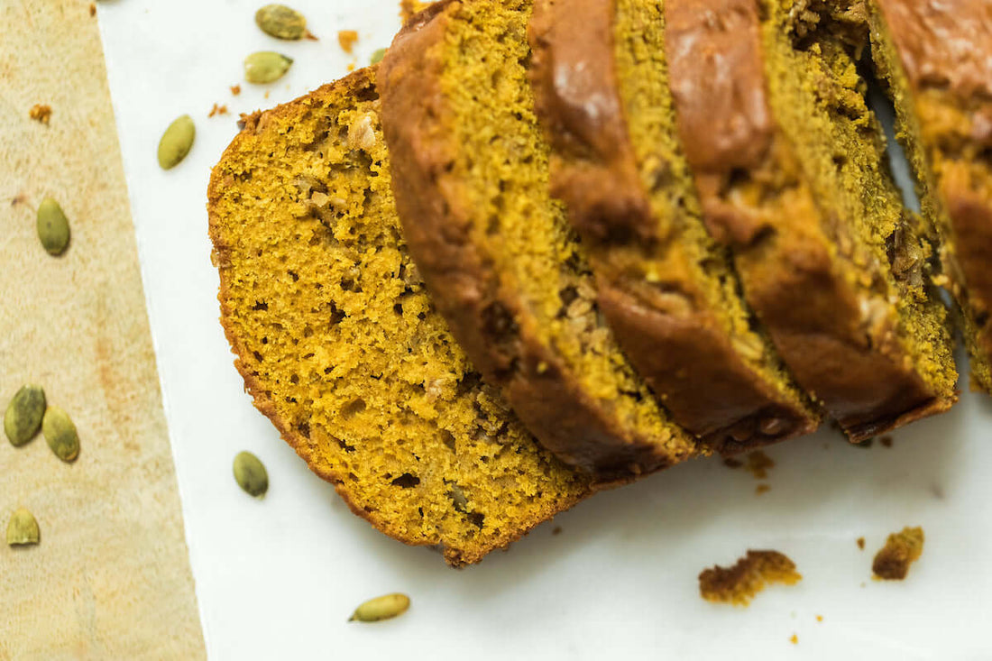 Sliced pumpkin spice zucchini bread made with Michele’s Pumpkin Spice Granola