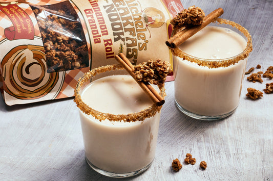 Two glasses of freshly made horchata, with a garnish of Cinnamon Roll Granola