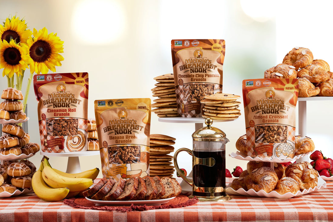 Michele's Breakfast Nook Granola, displayed on a table with the breakfast favorites that inspired the line