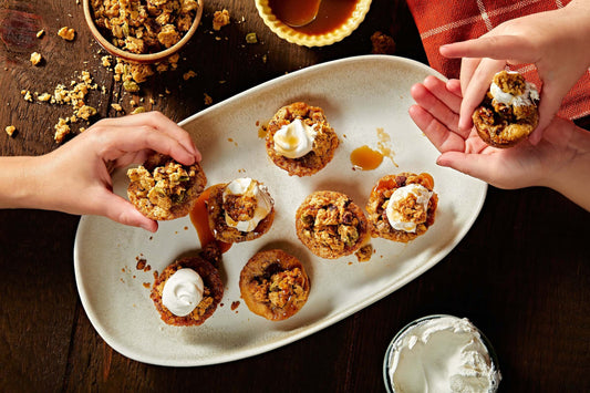 Little hands enjoying Salted Maple Pecan Granola tartlets