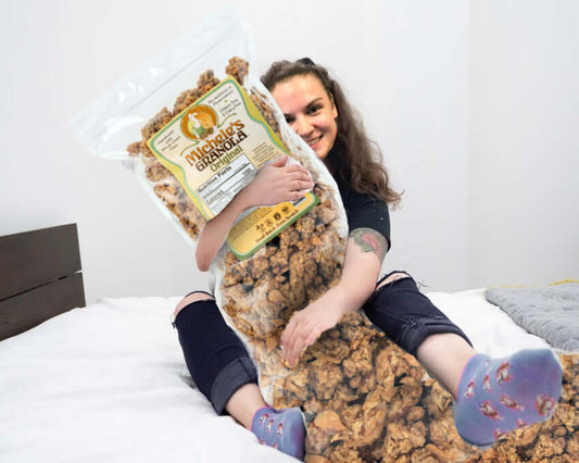 Sam holding giant bag of granola - April Fools'!