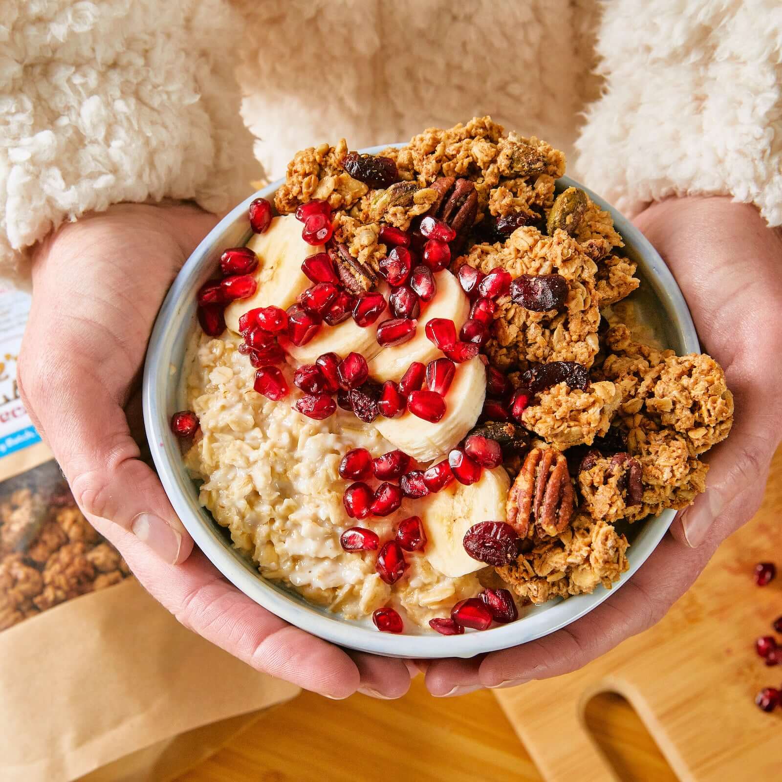 Michele's Cranberry Pecan Granola in a cozy oatmeal bowl