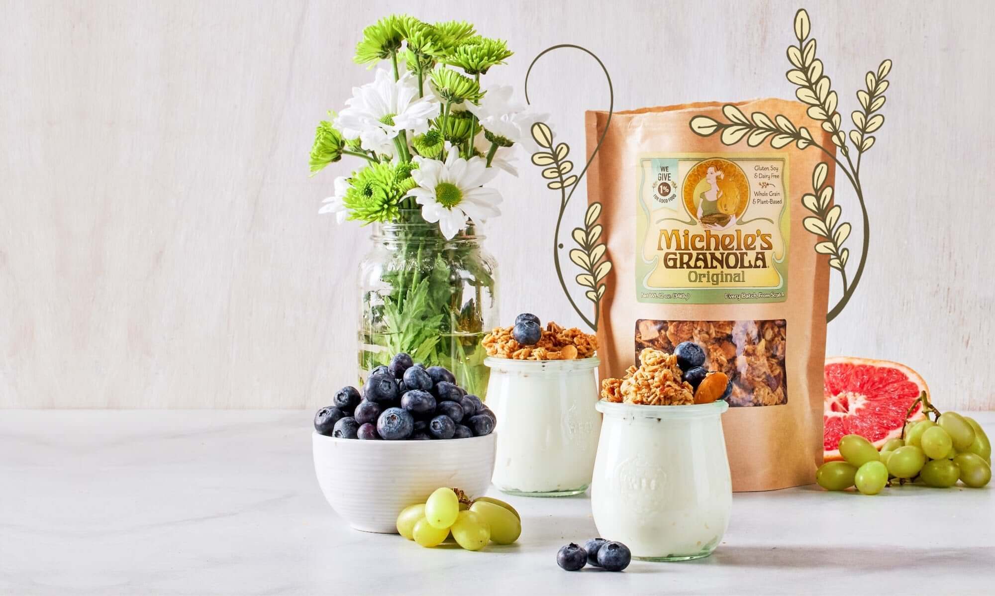 Michele's Original Granola served as part of a sunny breakfast with yogurt and fruit. Vegan, gluten-free, handmade in the USA