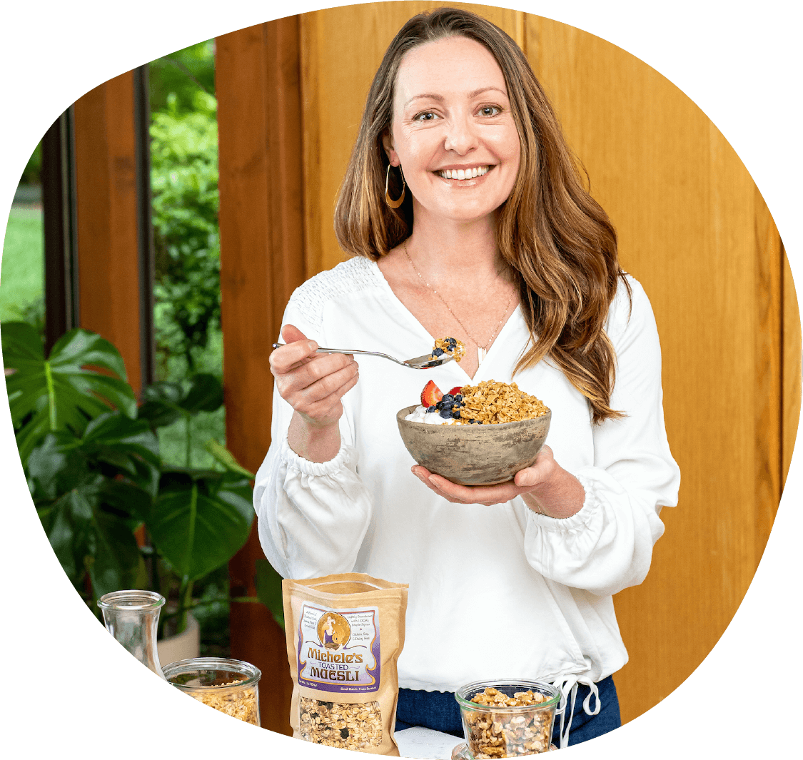 Michele holding a bowl of toasted Muesli Granola.